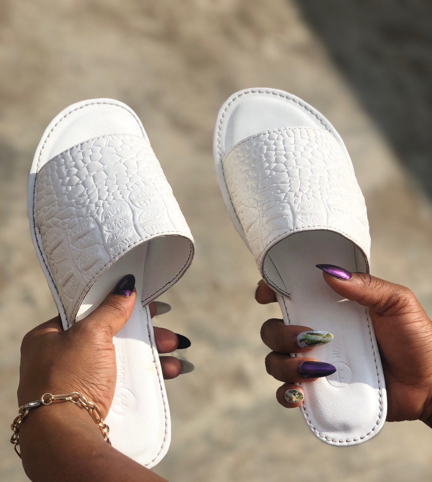 plaited leather slides